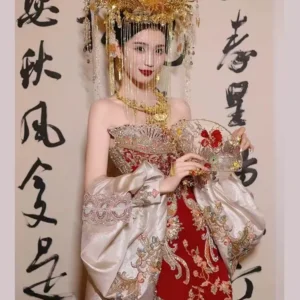 Red **Xiuhe-style traditional Chinese wedding dress**, 2025 new design for brides — elegant and sophisticated engagement and wedding attire featuring a **dragon and phoenix motif**.