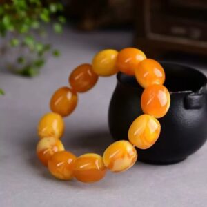 Natural amber bracelet for couples. Formed through wind and rain, it symbolizes a relationship that can withstand the test of time, lasting and stable.